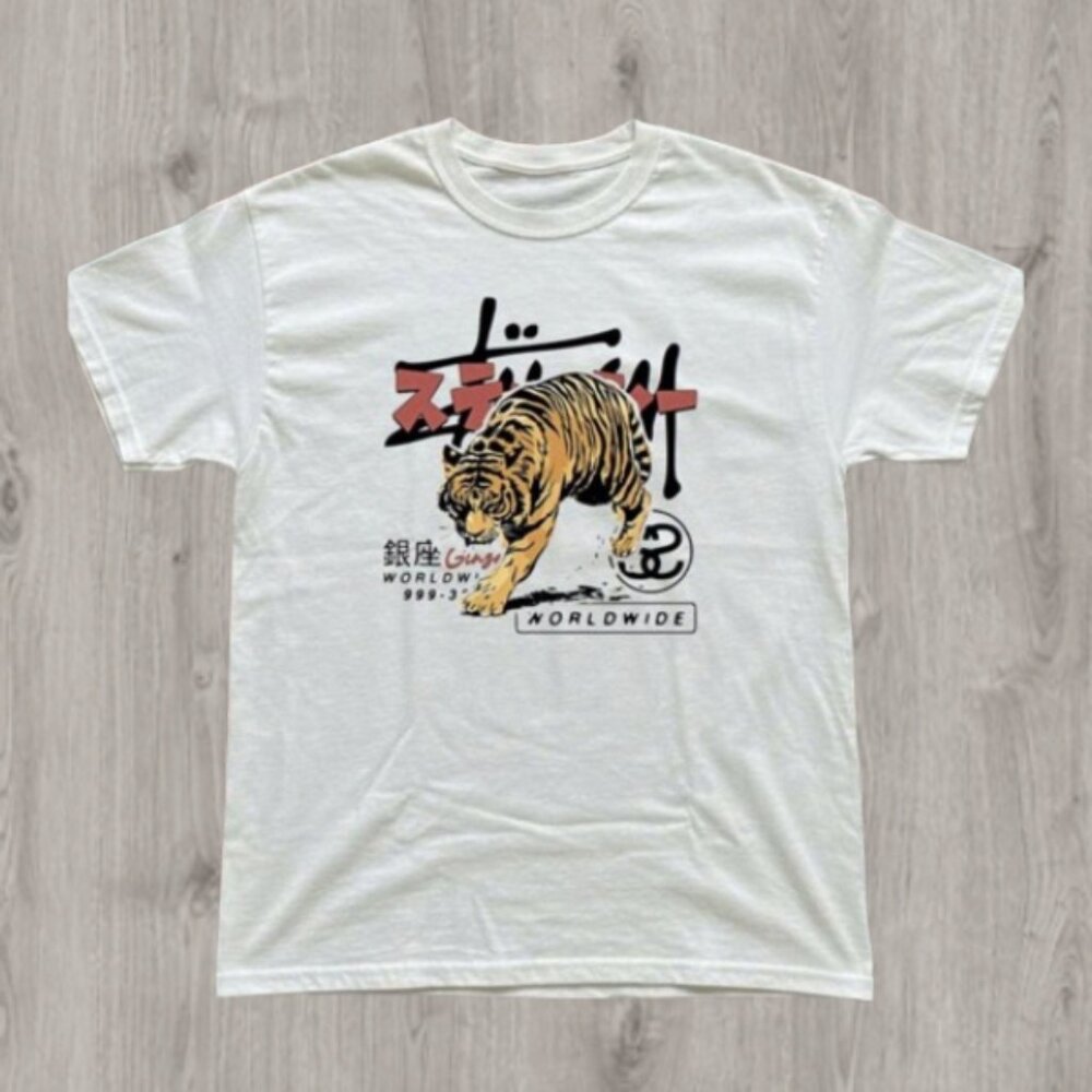 White shirt with tiger stussy graphic tee